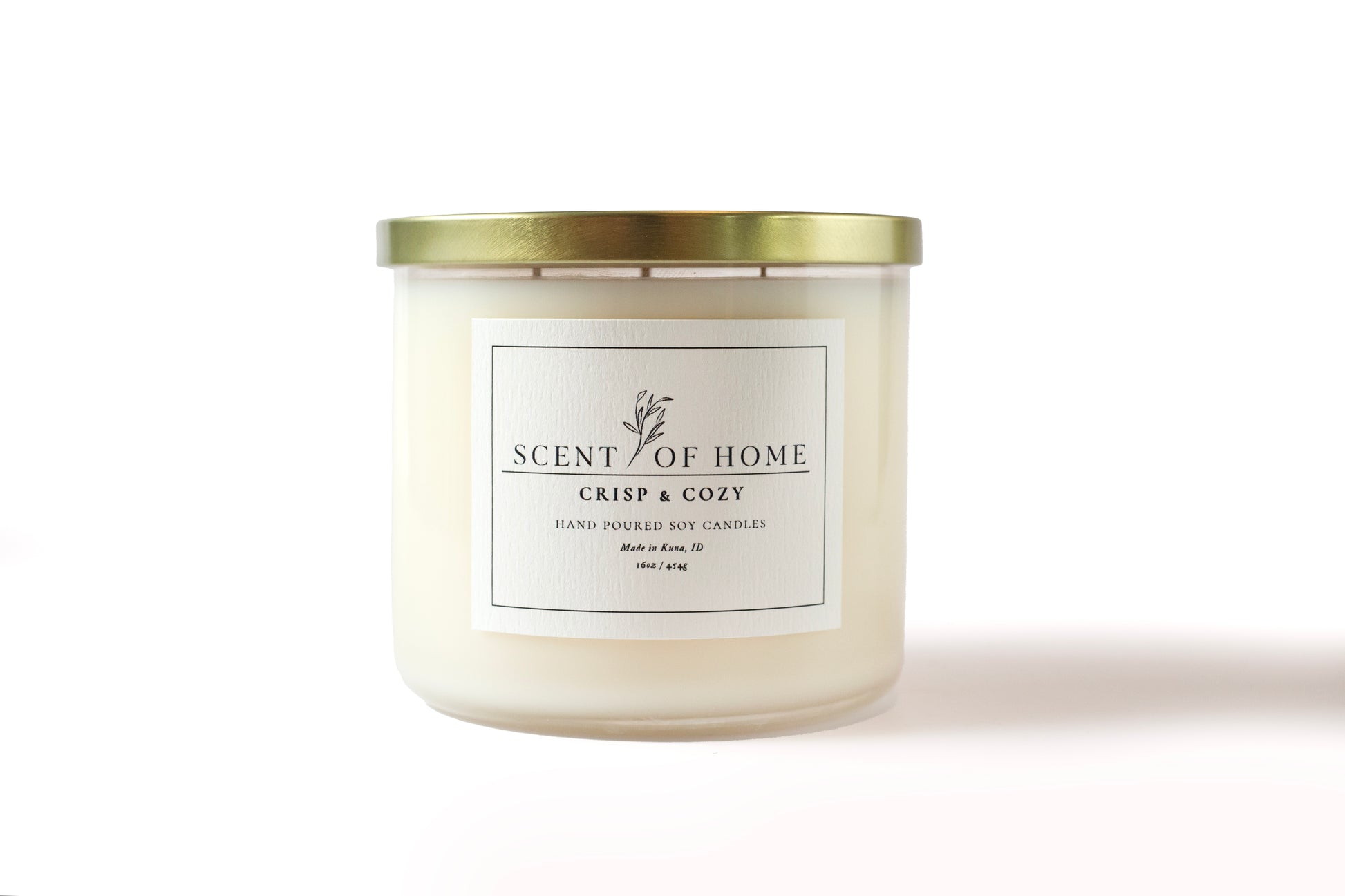 Scent of Home Crisp & Cozy 16oz three-wick candle with gold lid — a hand-poured soy candle crafted for warmth and comfort in every space
